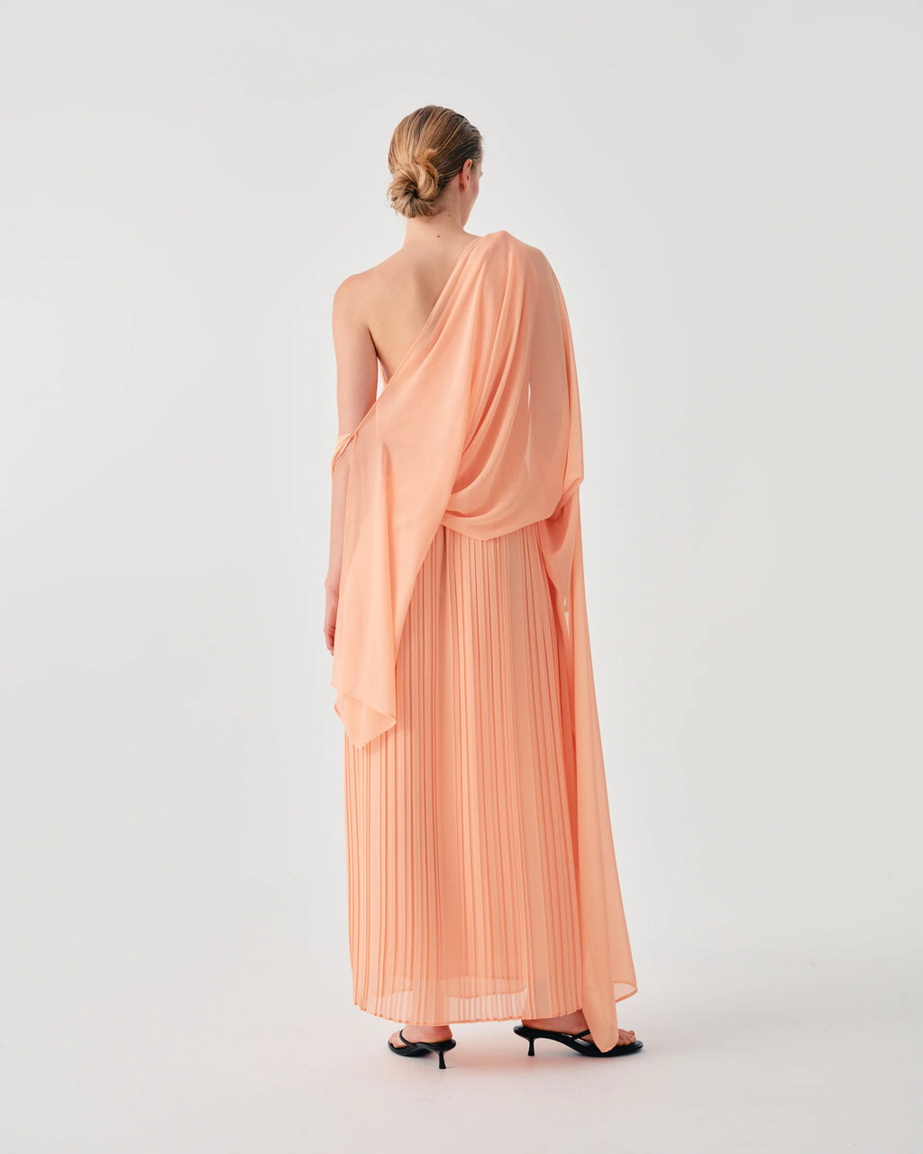 Beatrice B. Peach Chiffon Dress with Draped Bodice and Flowing Sleeves