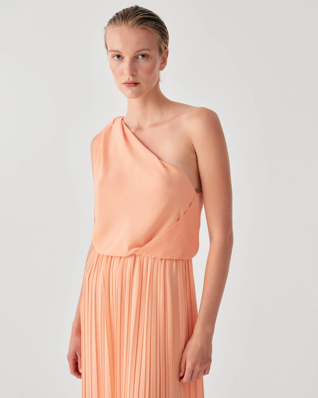 Beatrice B. Peach Chiffon Dress with Draped Bodice and Flowing Sleeves