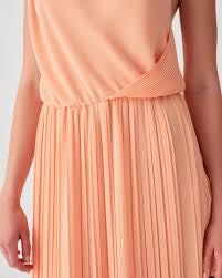 Beatrice B. Peach Chiffon Dress with Draped Bodice and Flowing Sleeves